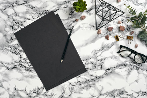 istock Top view in focus with different office equipment, supplies, stationery. Marble table with copy space. Education, workplace background. Close-up 1179808050