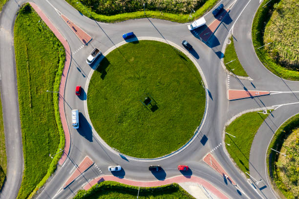 istock Traffic Circle with Cars, Bird's Eye View 1179808139