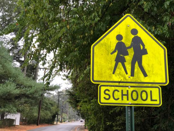 istock School crossing road sign 1179808184