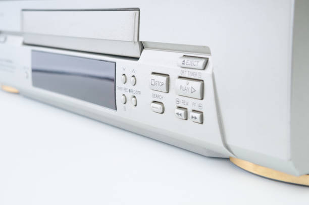 Old video recorder close up on white background
