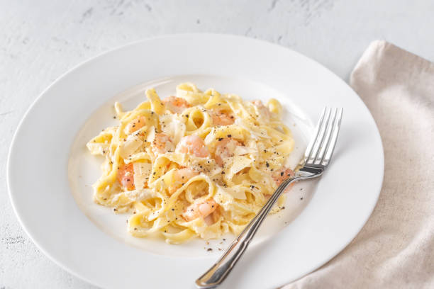 istock Portion of Shrimp Alfredo Pasta 1179811497