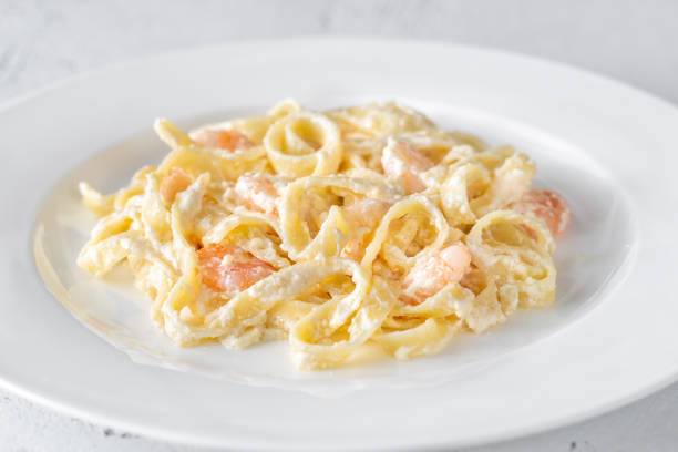 istock Portion of Shrimp Alfredo Pasta 1179811670