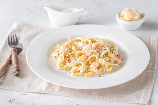 istock Portion of Shrimp Alfredo Pasta 1179811712