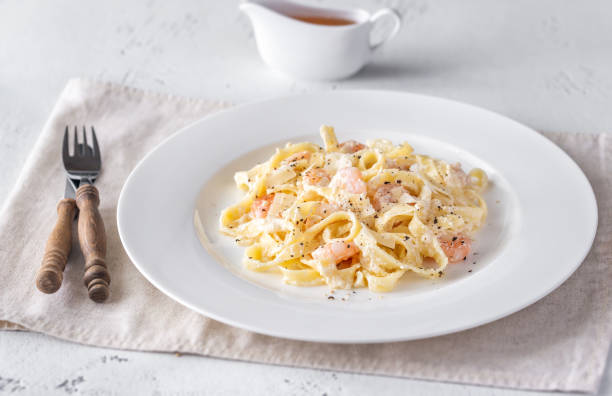 istock Portion of Shrimp Alfredo Pasta 1179811726