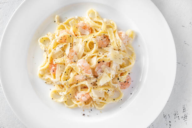 istock Portion of Shrimp Alfredo Pasta 1179811744