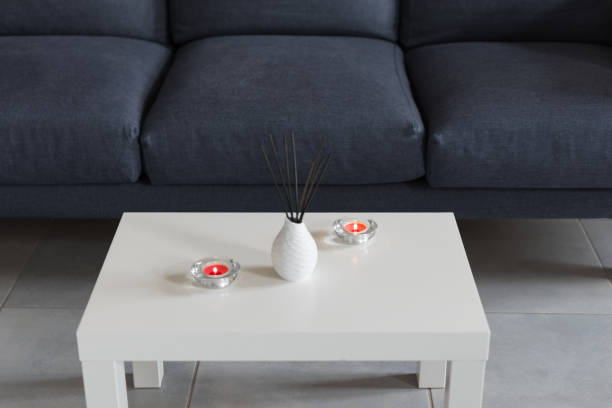istock Room air refreshers and candles on table on home interior background. 1179811777
