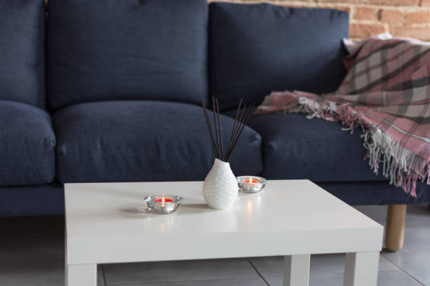 istock Room air refreshers and candles on table on home interior background. 1179811806