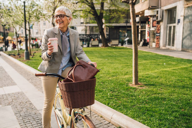 istock Woman sitting on a bicycle 1179811966