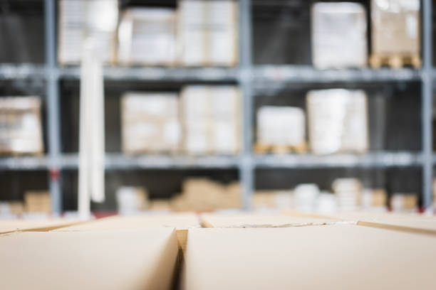 istock Stack of cardboard boxes in smart warehouse industry logistic. 1179813075