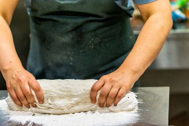 istock Female Chef Preparing Bread Dough for Selfmade Bread and Patties 1179815931