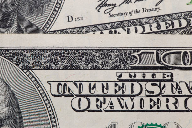 istock Texture of dollar bills. One hundred dollars. Close-up, macro 1179818997