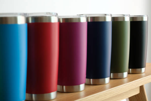 Various colors of stainless steel tumblers stock photo