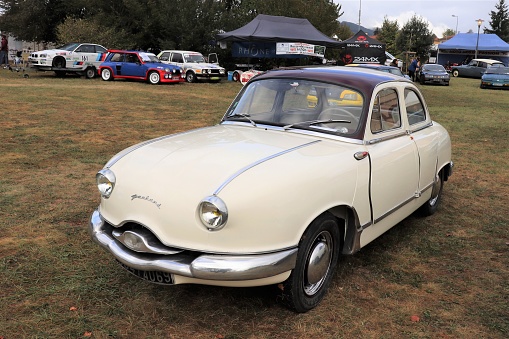 Panhard Dyna Z12 - Sedan car 4 doors - Year 1957 - Creamy white color - Motor show in the town of Mornant - Rhone department October 6, 2019 - Front of the vehicle