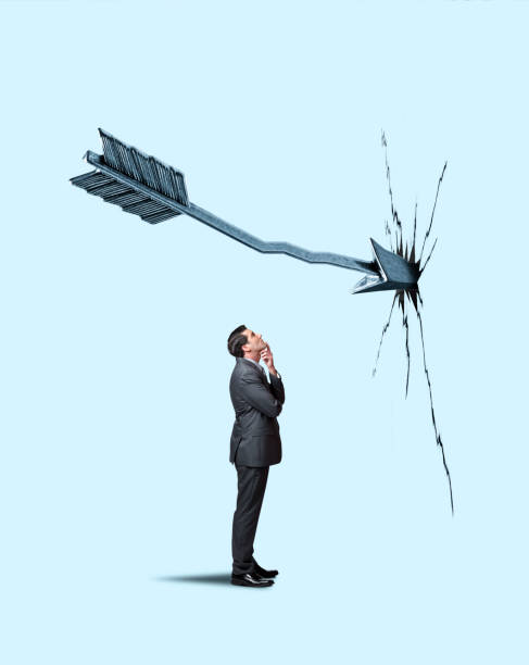 istock Businessman Looking Up At Arrow 1179828271