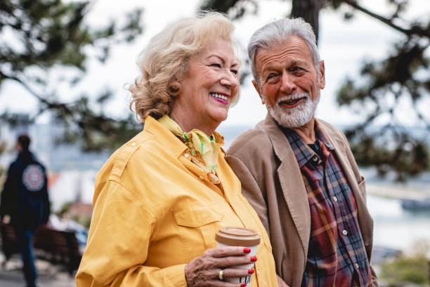 istock Senior couple enjoying a day in park 1179828509