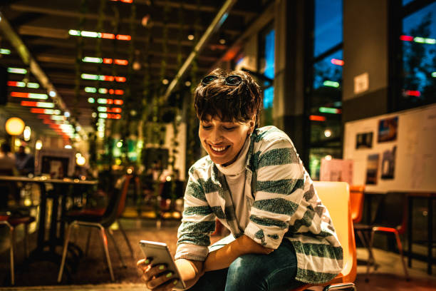 istock Millenial girl using phone 1179830492