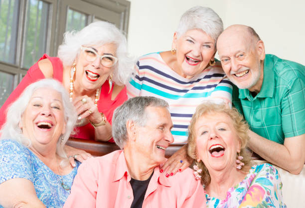 istock Six Laughing Senior Friends 1179830853