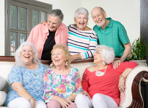 istock Six Laughing Senior Friends 1179835235
