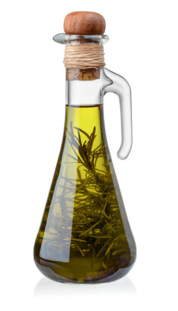 bouteille d'huile d'olive au romarin - vinegar bottle herb white photos et images de collection