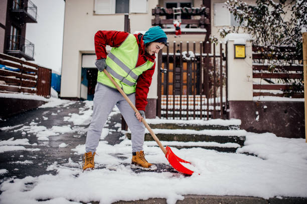 Man with snow shovel stock photo