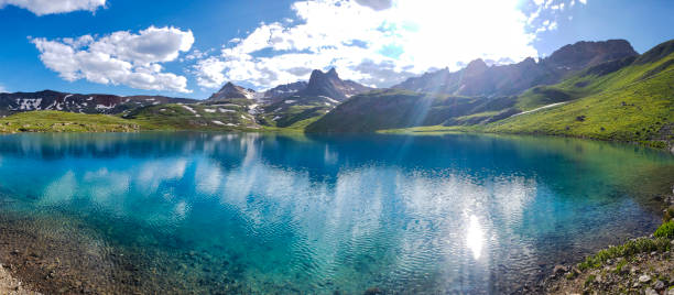 istock Sunshien on an Alpine Mountain Lake 1179841266