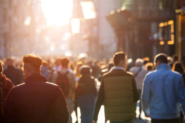 istock Blurred crowd of unrecognizable at the street 1179844034