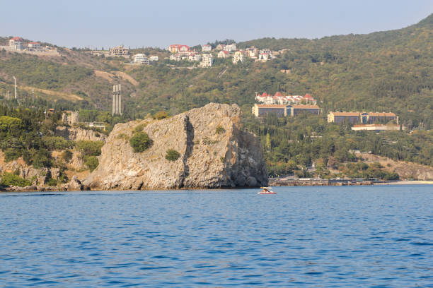 istock Stone cliff near the shore. 1179850029