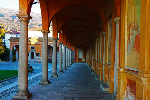 beautiful Baveno Cathedral inner garden. Coutryard. Old columns.