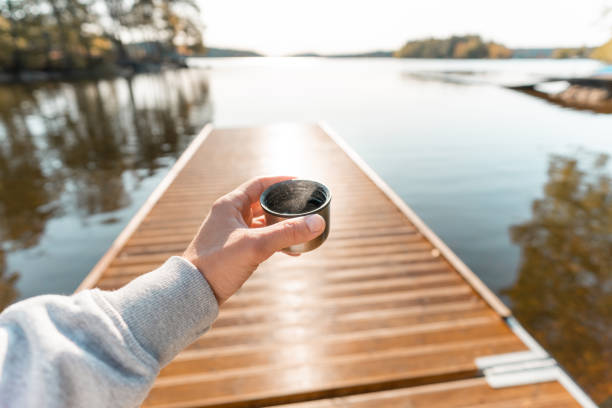 istock Personal perspective of a man drinking coffee outdoors 1179852419