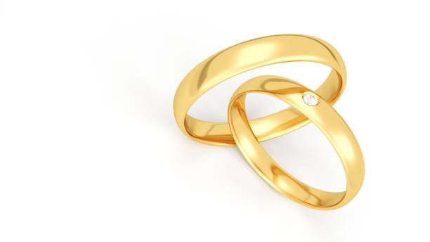 istock Gold wedding rings isolated on white background. Diamond. 1179854959