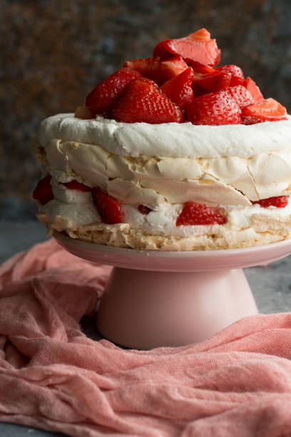istock Pavlova cake topped with strawberries. 1179856199