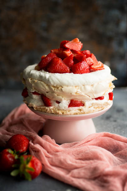 istock Pavlova with whipped cream and strawberries. 1179856213