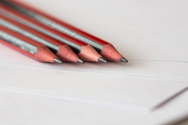 istock Pencils and sheets of paper 1179865824