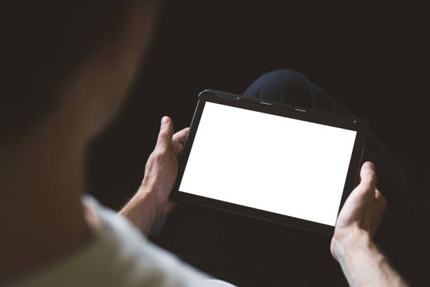 istock A man with a tablet in his hands. 1179867060