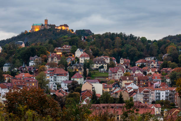 The Wartburg Castle with the City of Eisenach in Germany stock photo