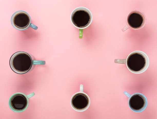 istock Coffee in the different cups on the pink background. Flatlay, cheerful day concept 1179871114