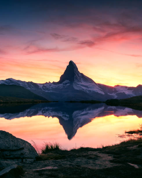 istock Matterhorn peak on Stellisee lake 1179871922