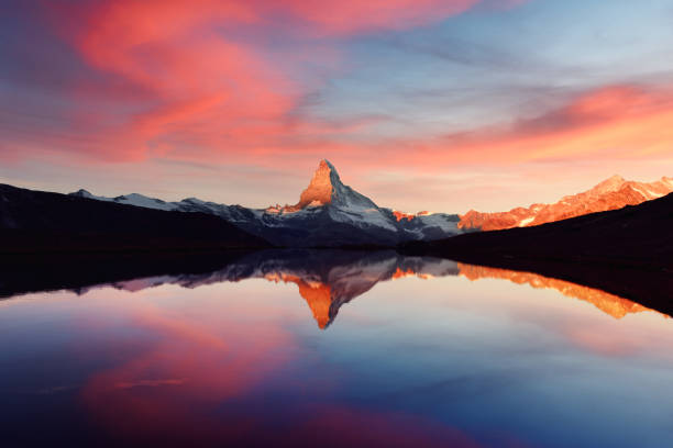istock Matterhorn peak on Stellisee lake 1179871927