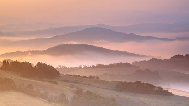 istock Tuscany foggy hills panorama view 1179877171