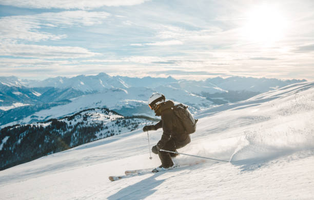 donna che scia a laax, svizzera. - skiing winter snow scenics foto e immagini stock