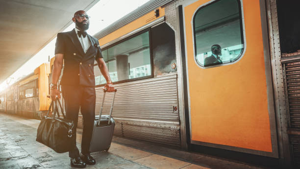 istock African man on a railway station 1179880341