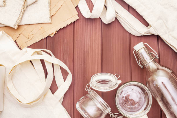 istock Assortment eco friendly packaging, zero waste, paper, glass and textile for free plastic shopping. Recycled materials 1179880947