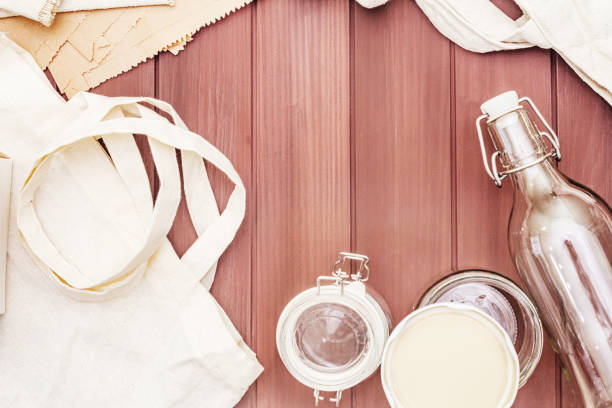 istock Assortment eco friendly packaging, zero waste, paper, glass and textile for free plastic shopping. Recycled materials 1179880963