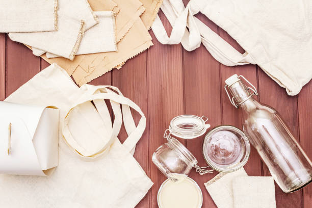 istock Assortment eco friendly packaging, zero waste, paper, glass and textile for free plastic shopping. Recycled materials 1179880967