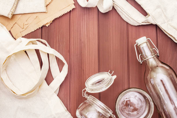 istock Assortment eco friendly packaging, zero waste, paper, glass and textile for free plastic shopping. Recycled materials 1179881120