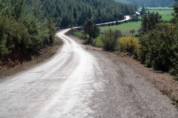 istock Single Lane Country Road 1179881336