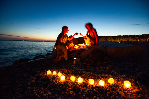istock Couple on Romantic Date on Beach 1179882285