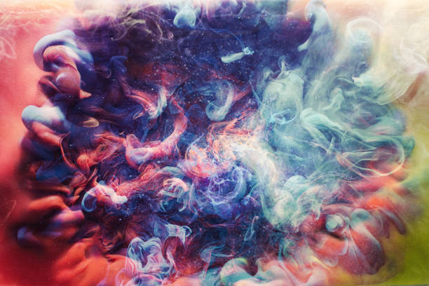 istock art background enchanted fume blue red paint mix 1179885142