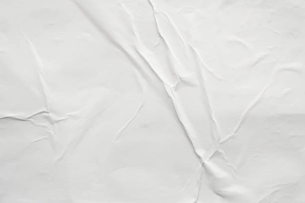 istock Blank white crumpled and creased paper poster texture background 1179885161