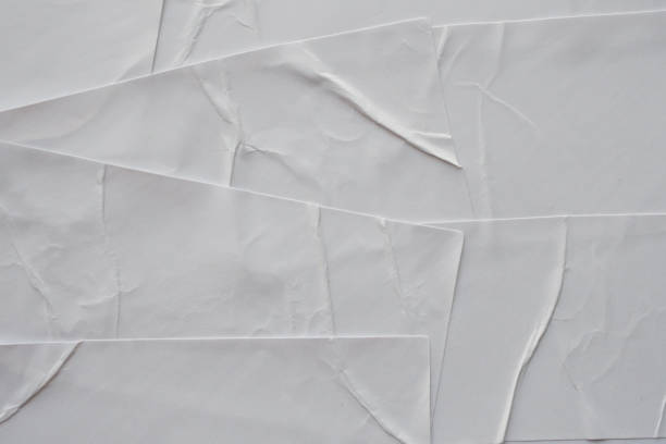 istock Blank white crumpled and creased sticker paper poster texture background 1179885166